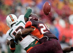 Virginia Tech DB Dorian Porch sacked Jacory Harris and forced him to fumble early in the first quarter, marking the start of a long day for the Miami quarterback. (AP Photo/Steve Helber)